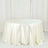 Round ivory satin tablecloth on a white backdrop.