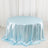 Round light blue satin tablecloth on a plain backdrop