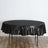 Round black tablecloth draped elegantly over a table.