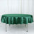 Green satin round tablecloth on a table