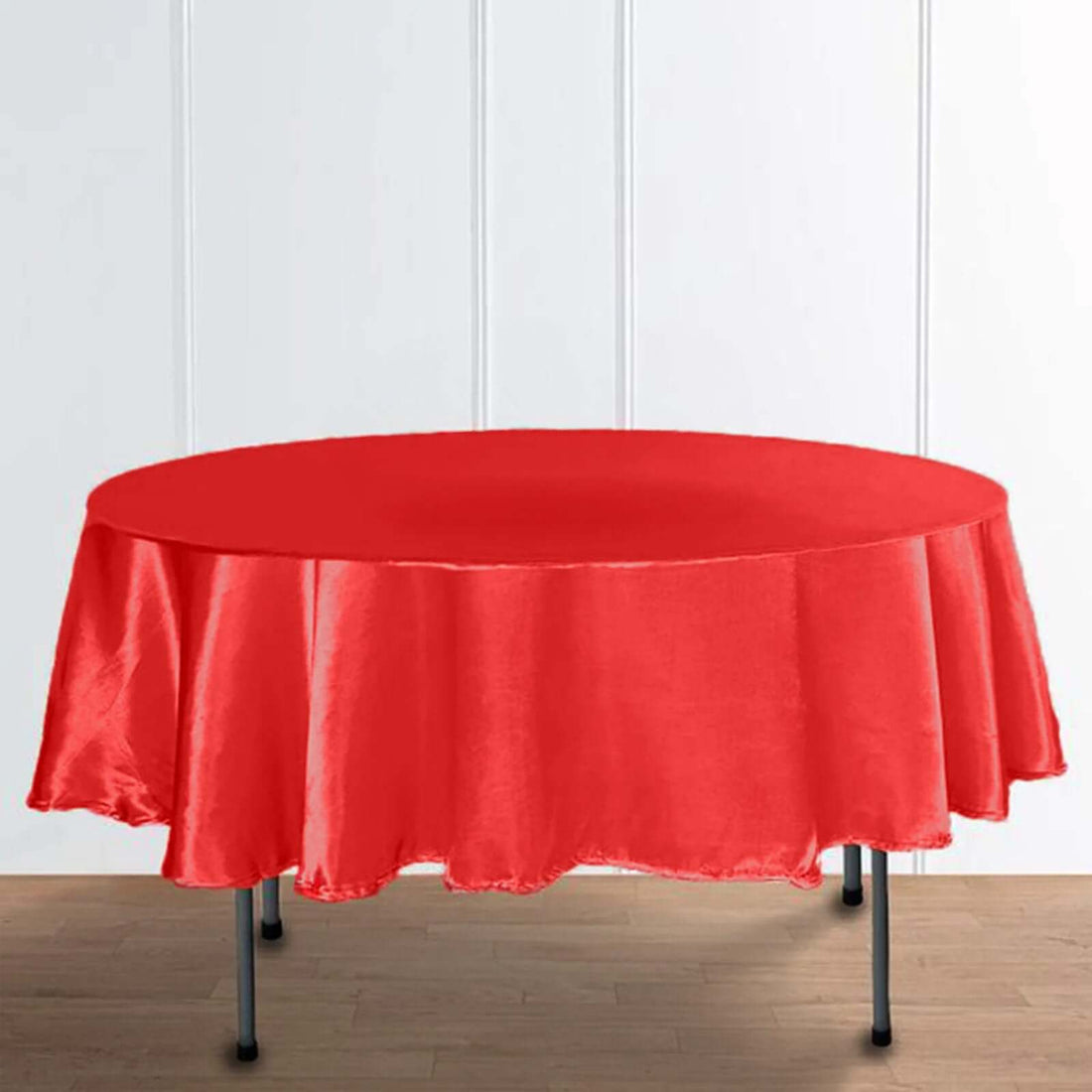 Red round tablecloth draped elegantly over a table.
