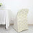 Elegant chair cover with white floral design, perfect for special occasions.