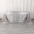 Silver striped tablecloth draped over a table in a studio setting.