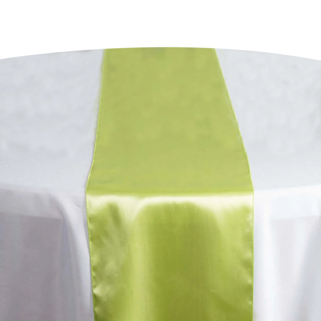 Green satin table runner on a white tablecloth #whtbkgd