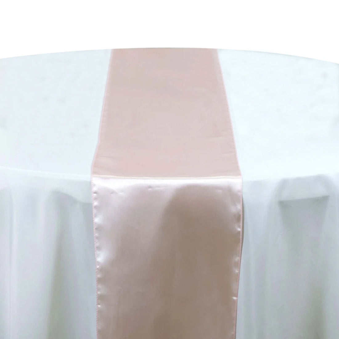 Pink satin table runner on a white tablecloth  #whtbkgd