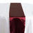 Burgundy satin table runner on a white table #whtbkgd