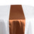 Copper satin table runner on a white tablecloth. #whtbkgd