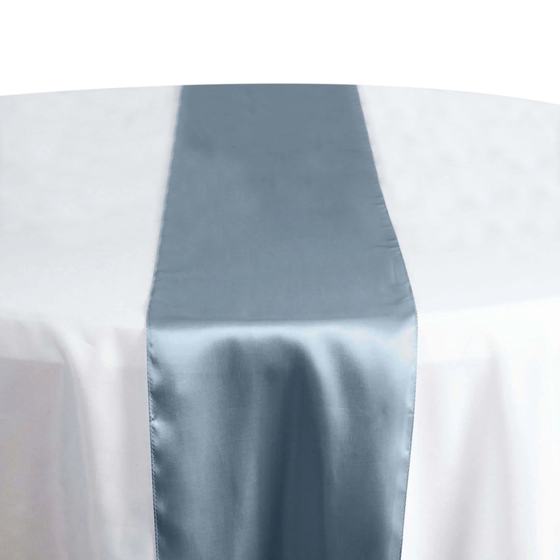 Blue satin table runner on a white tablecloth #whtbkgd