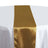 Gold satin table runner on a white tablecloth. #whtbkgd