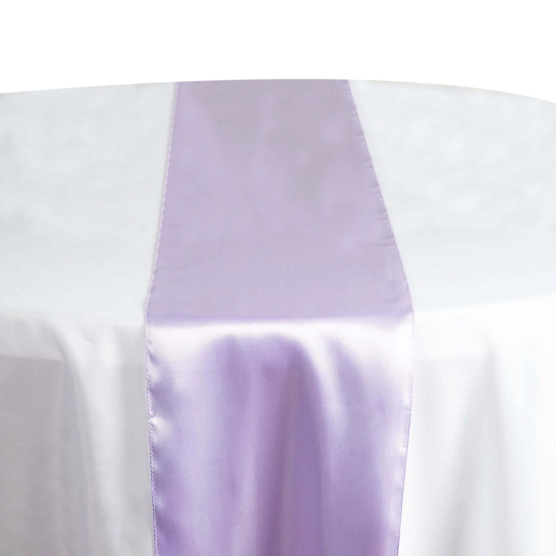 Purple satin table runner on a white tablecloth #whtbkgd