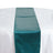 Teal satin table runner on a white tablecloth #whtbkgd