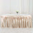 Elegant champagne table skirt with draped design for events and weddings.