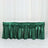 Green satin table skirt with elegant draping for events and celebrations.