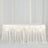 White satin table skirt with elegant draping and pleats.