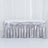 Silver satin tablecloth with elegant draping design.