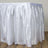 White satin table skirt draping elegantly over the edge of a table.