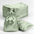 Set of green satin drawstring bags and pillowcases