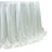 Sparkling white tablecloth with ruffled edges and glittering details