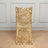 Gold sequin table cover with a shimmering design.