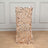 Rose gold sequin chair cover on a wooden floor.