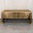 Gold tablecloth draped over a rectangular table.