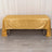 Gold glitter tablecloth draping over a table in a studio setting.