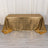 Gold tablecloth with a shimmering finish draped elegantly over a table.