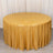 Gold sequin tablecloth draping over a round table.