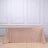 Rose gold sequin tablecloth on a plain backdrop.