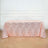 Rose gold geometric tablecloth on a wooden surface.