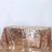 Rose gold sequin tablecloth draped elegantly over a table.
