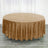 Brown round tablecloth with shimmering texture on a wooden floor.