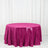 Round fuchsia sequin tablecloth on a white backdrop