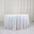 Round sequin tablecloth in iridescent white on a plain background.