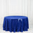 Blue sequin tablecloth on a round table in a studio setting.
