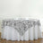 Silver sequin tablecloth draped elegantly over a white table