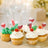 Colorful cupcakes with festive decorations for a celebration.