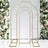 Gold metal arch backdrop for events and weddings. Elegant floral arrangement.