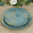 Elegant teal plates with floral gold designs, perfect for dining.