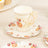 Floral paper cup and saucer set for parties and events