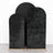 Three black fabric backdrops in varying sizes on wooden stands.
