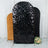 Sequin backdrop in black, gold, and silver for events and photography.