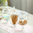 Glass candy jars with colorful treats and cookies.
