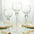 Elegant set of three glass goblets on a dining table.