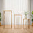 Modern geometric wooden side tables in a stylish living room setting.