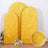 Three golden arch-shaped backdrops with a textured finish.