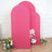 Three pink fabric panels with floral arrangements on either side, studio shot.