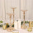 Elegant gold candle holders with crystal accents on a table setting.