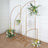 Gold arch backdrop with floral arrangements for events and photography.