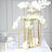 Elegant gold vase with white orchids on a table setting.